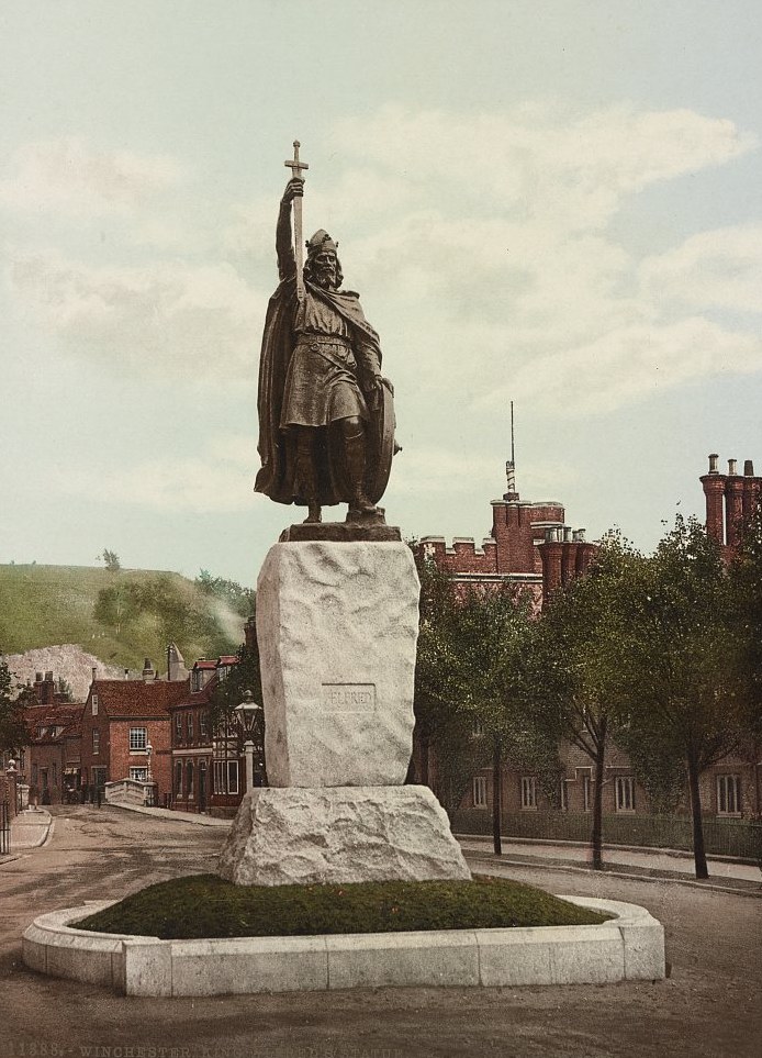 Photochrom print of about 1905 showing the bronze statue of King Alfred in Winchester, sword raised, on a granite plinth